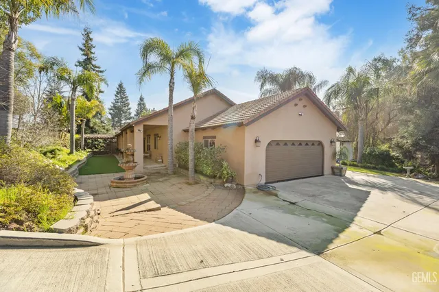 a view of a house with a sink and yard
