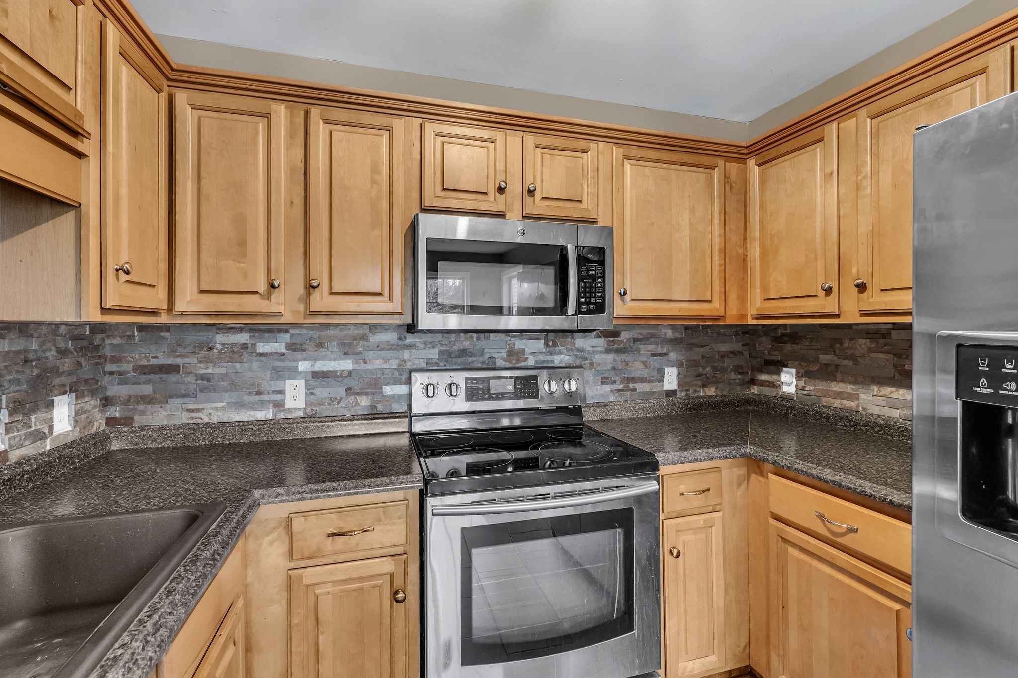 4237 Kedron Road Spring Hill, TN 37174 - Photo 12 of 48 a kitchen with a sink and a microwave