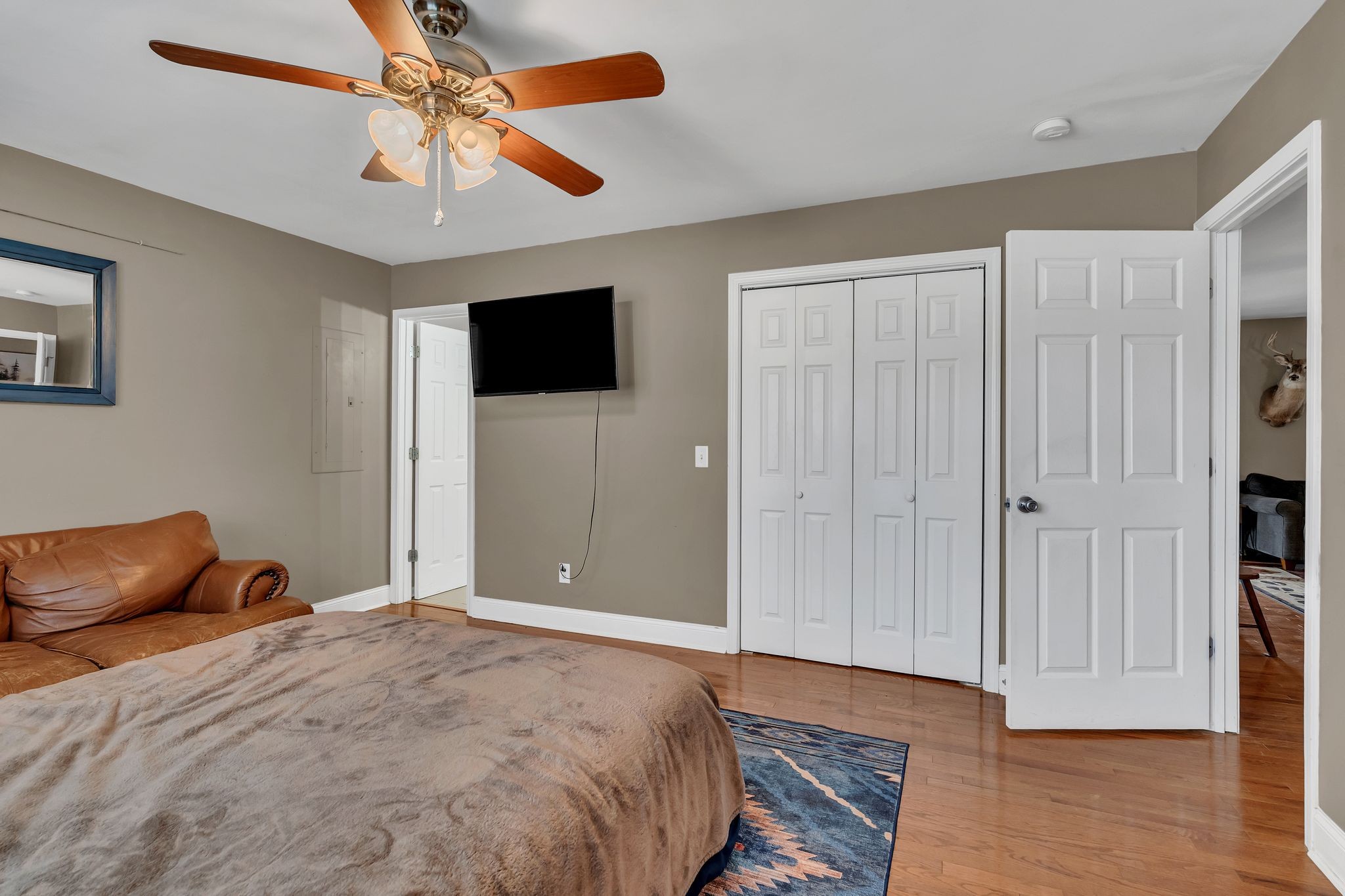 4237 Kedron Road Spring Hill, TN 37174 - Photo 17 of 48 a bedroom with a bed and a flat screen tv