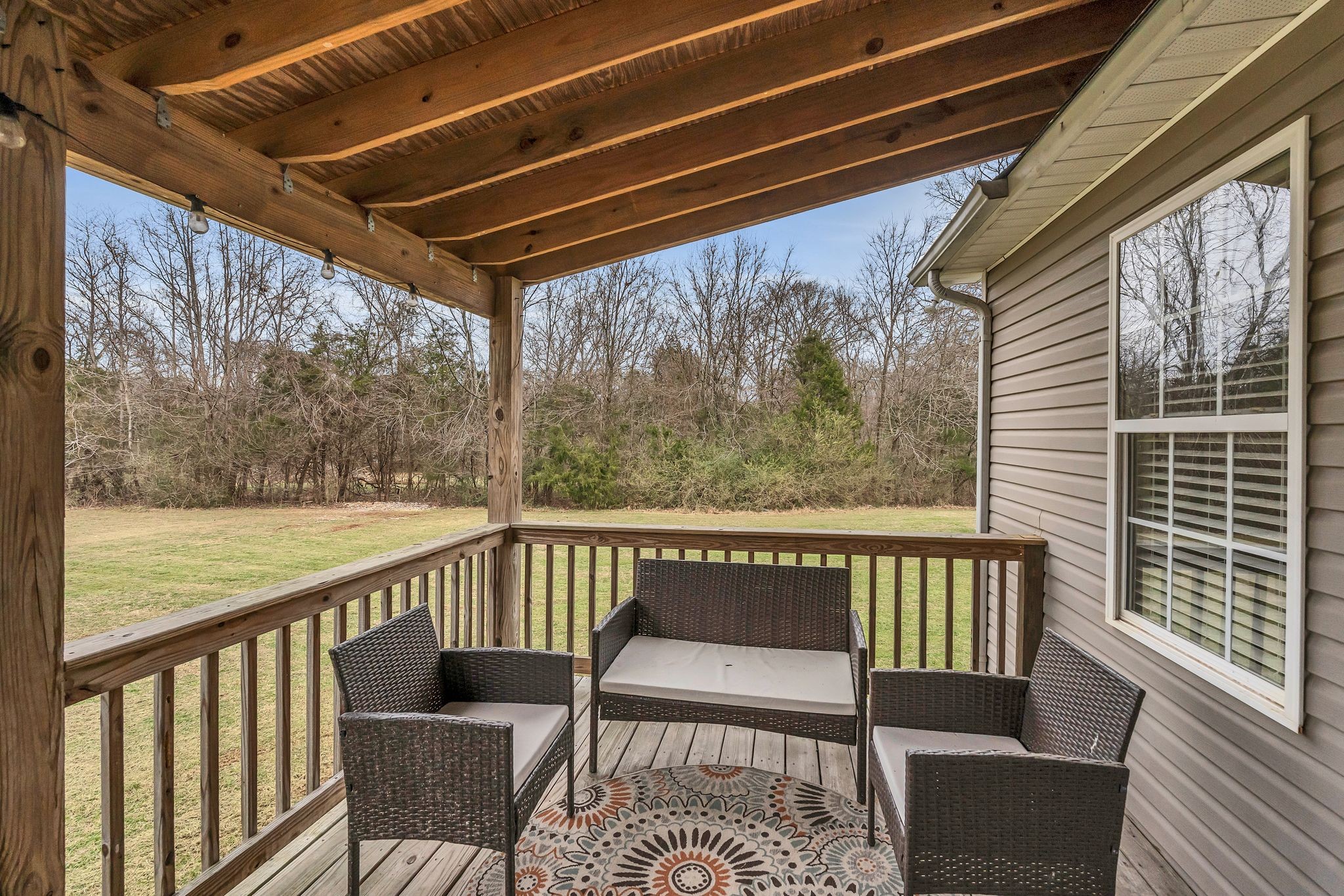 4237 Kedron Road Spring Hill, TN 37174 - Photo 24 of 48 a view of a chair and table on the balcony