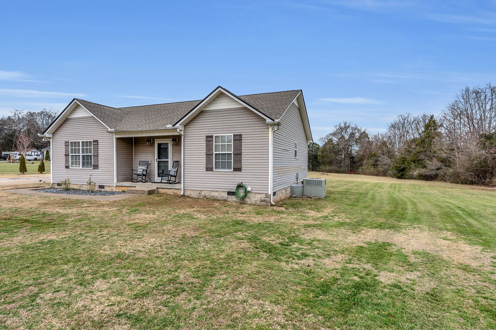 4237 Kedron Road Spring Hill, TN 37174 - Photo 6 of 48 a view of a house with a backyard and a garden