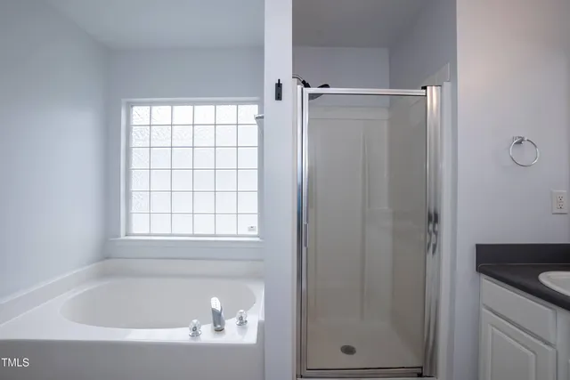 a bathroom with a bathtub