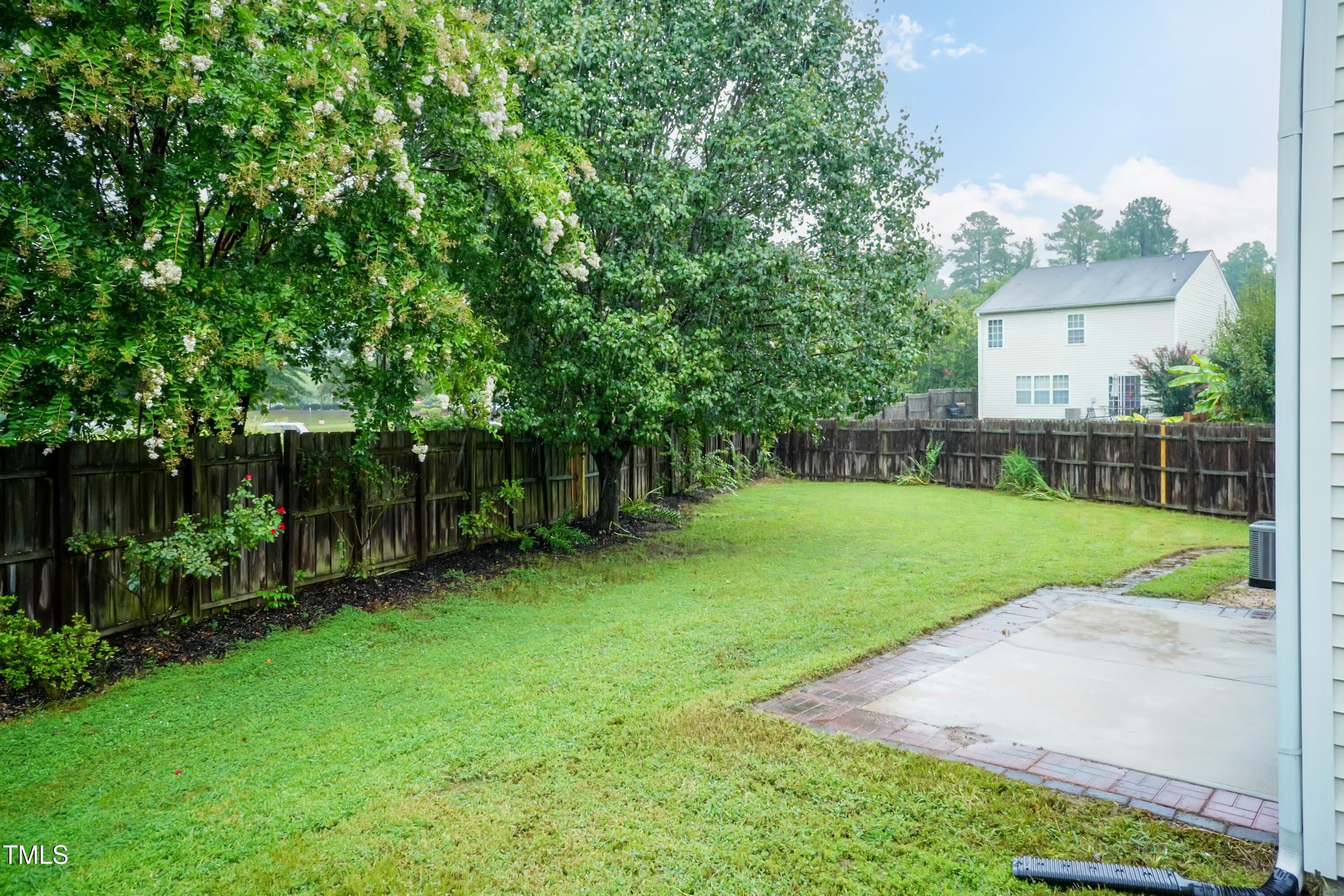 8 Kingfisher Way Durham, NC 27713 - Photo 24 of 25 a view of a house with a back yard