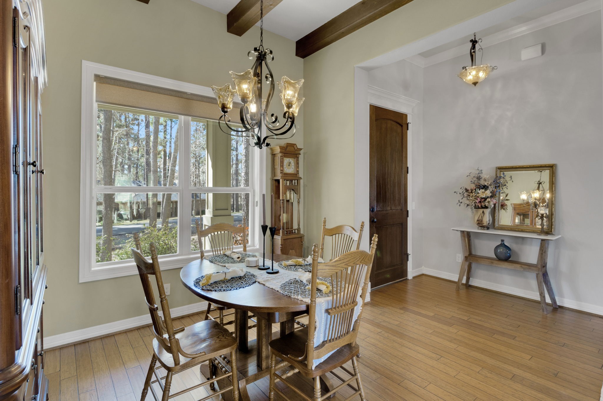 1040 Kings Way Coldspring, TX 77331 - Photo 11 of 50 a view of a dining room with furniture window and wooden floor