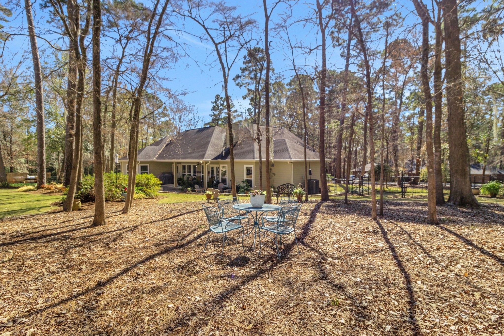 1040 Kings Way Coldspring, TX 77331 - Photo 21 of 50 a view of a house with backyard and sitting area