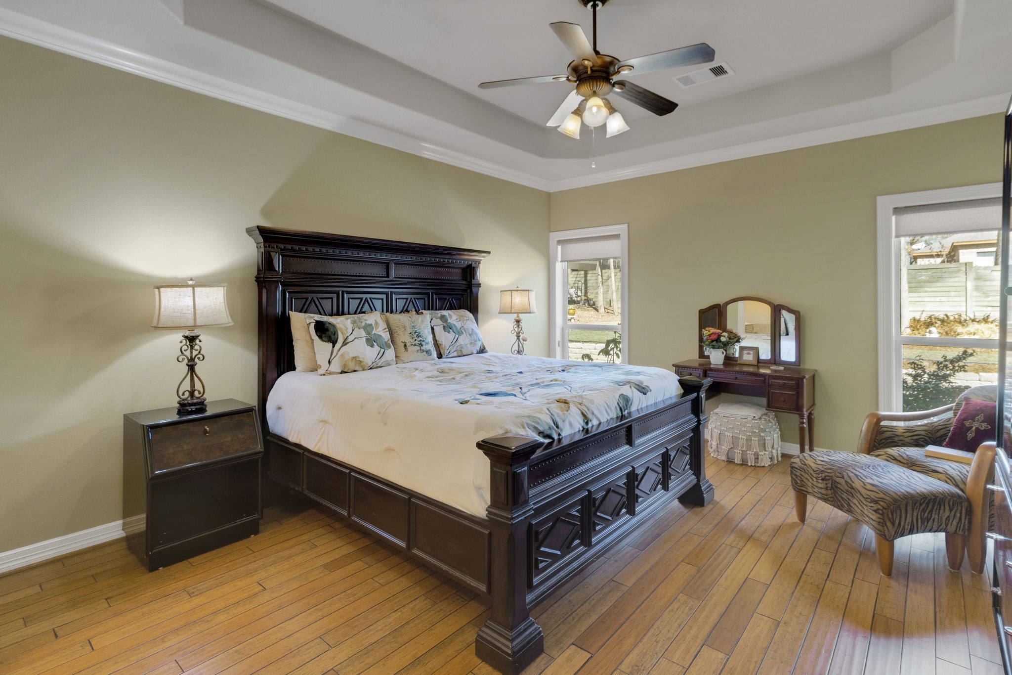 1040 Kings Way Coldspring, TX 77331 - Photo 27 of 50 a bedroom with a bed and a chandelier