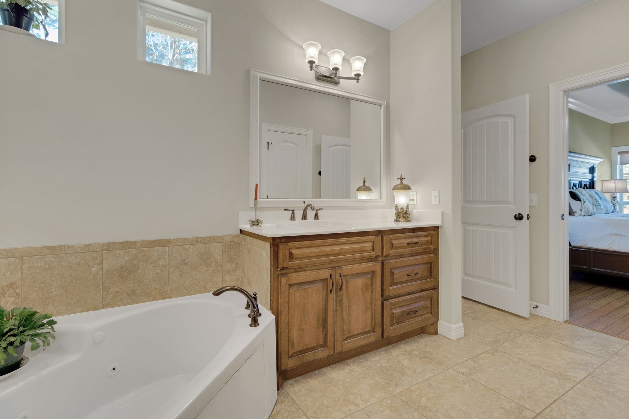 1040 Kings Way Coldspring, TX 77331 - Photo 31 of 50 This primary bath leads to the spacious walk-in closet, providing ample storage space