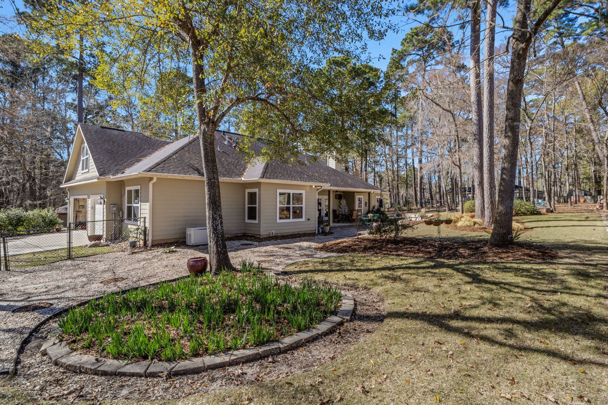 1040 Kings Way Coldspring, TX 77331 - Photo 42 of 50 a front view of a house with garden