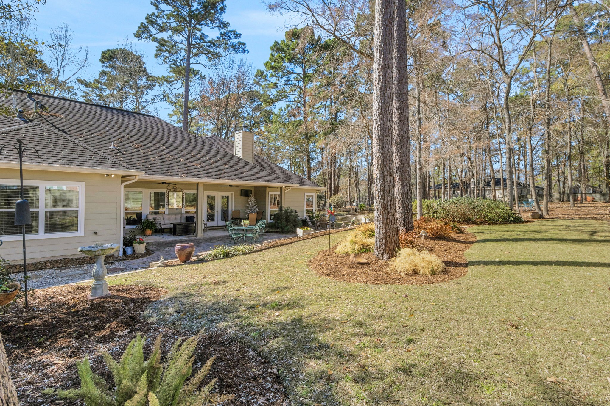 1040 Kings Way Coldspring, TX 77331 - Photo 43 of 50 a view of a house with backyard and sitting area