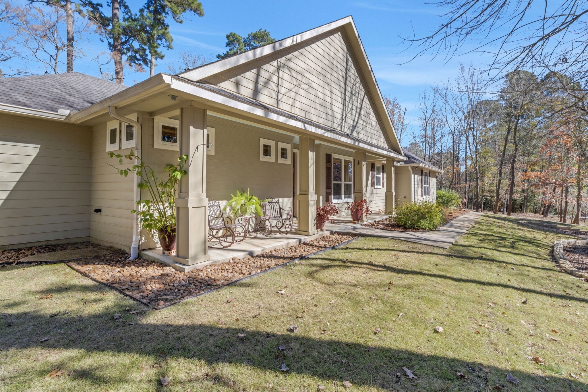 1040 Kings Way Coldspring, TX 77331 - Photo 8 of 50 The welcoming front porch makes it feel like home the moment you arrive