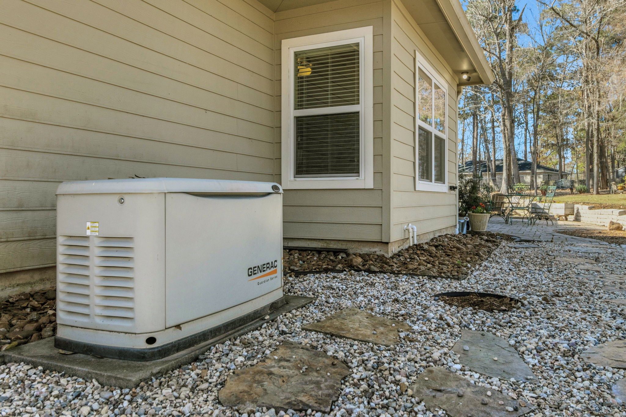 1040 Kings Way Coldspring, TX 77331 - Photo 9 of 50 Whole-home generator and 750 gallon propane tank provides peace of mind during outages (along with whole home surge protector)