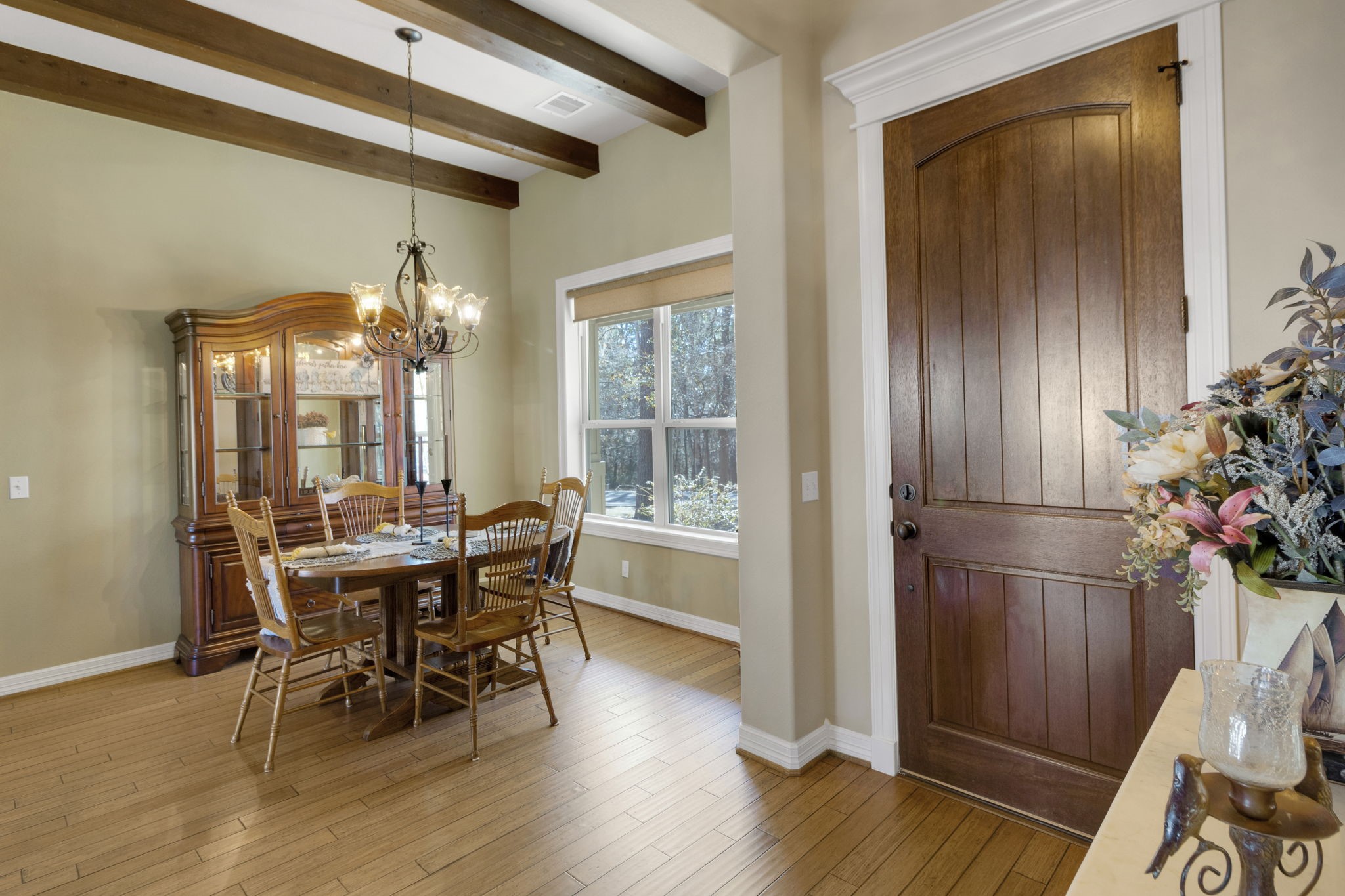 1040 Kings Way Coldspring, TX 77331 - Photo 10 of 50 a view of a dining room with furniture and chandelier