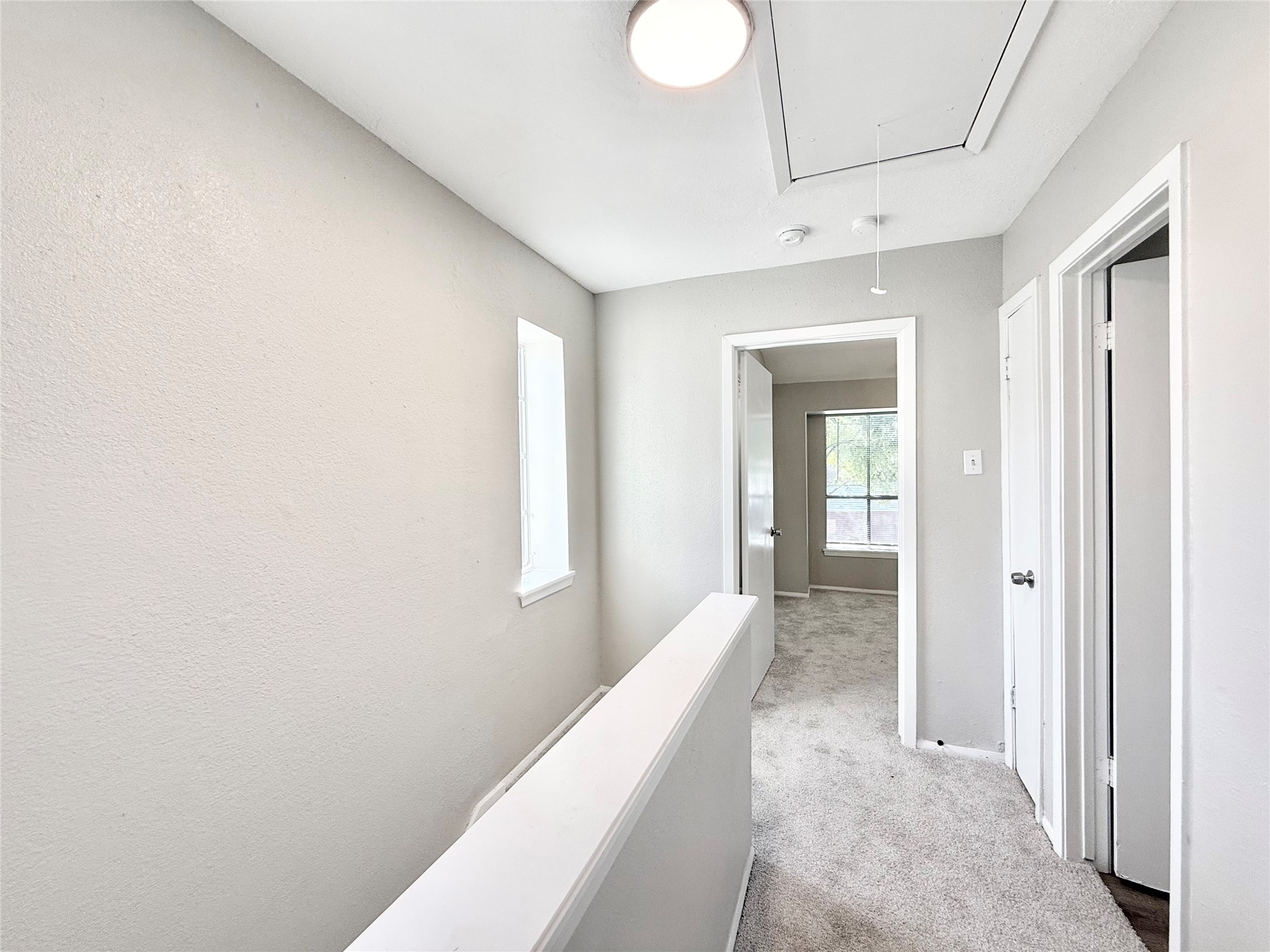 7980 Grove Ridge Drive Houston, TX 77061 - Photo 10 of 19 Upstairs Hall has two Closets for storage and leads to 2 large Bedrooms and the Bath