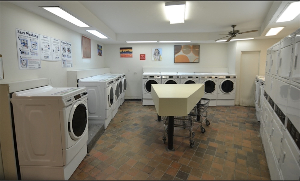 67 St Germain Street, Unit 232 Boston, MA 02115 - Photo 14 of 15 a utility room with dryer and washer