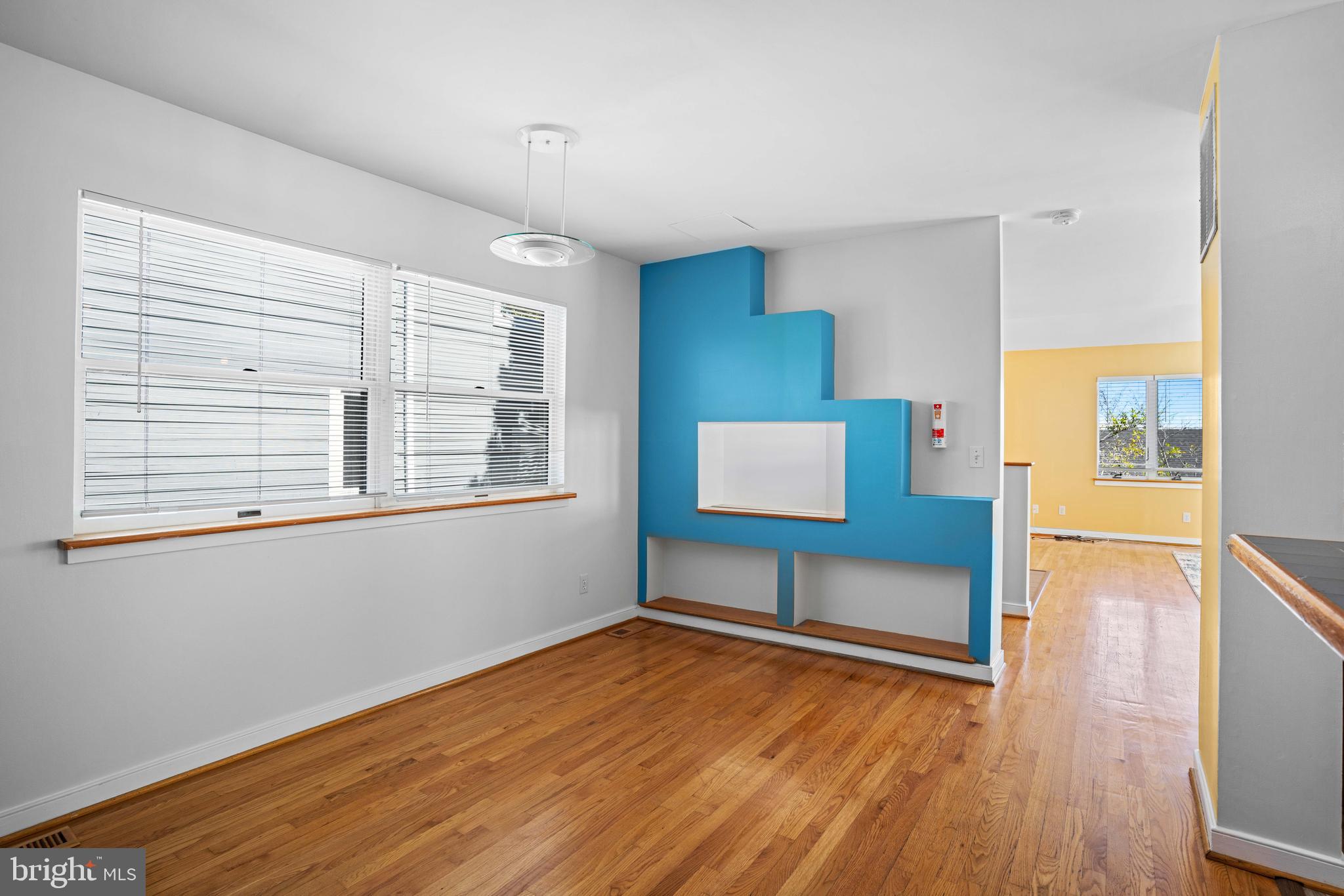 4734 Oak Road Shady Side, MD 20764 - Photo 13 of 48 a view of an empty room with window wooden floor