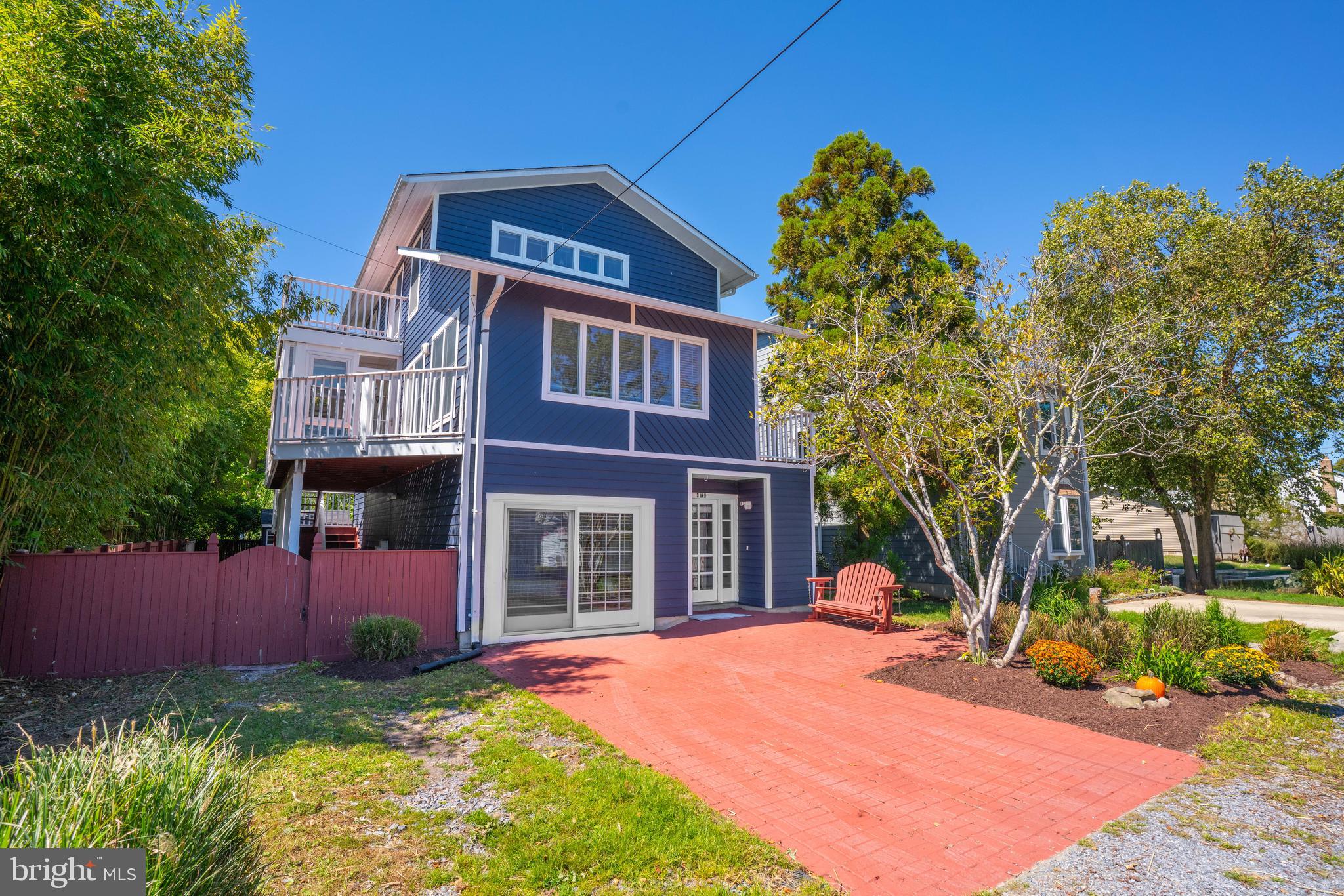 4734 Oak Road Shady Side, MD 20764 - Photo 2 of 48 a front view of a house with a yard