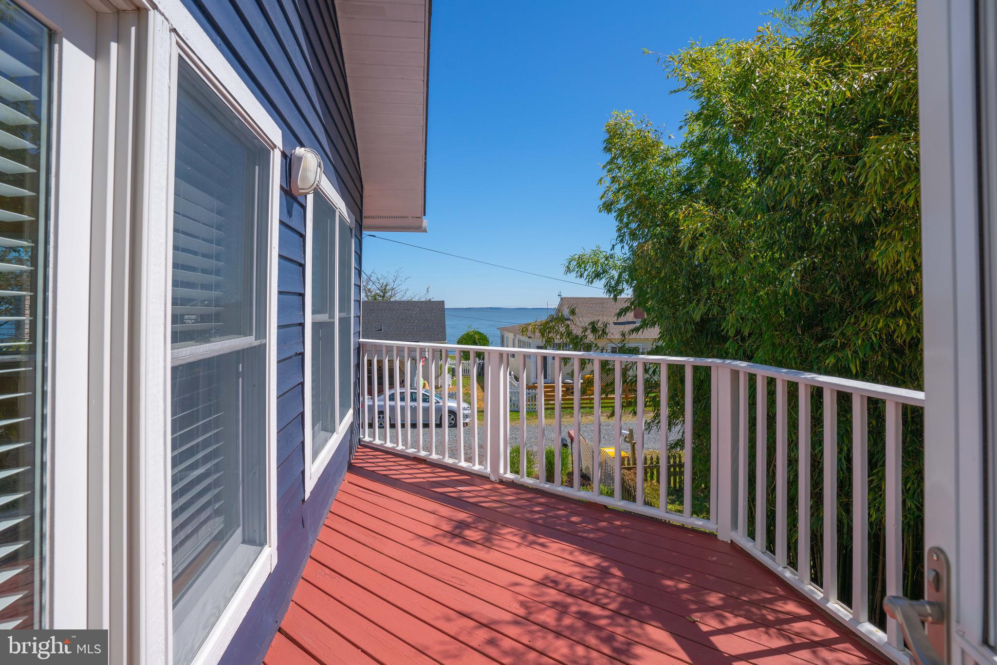 4734 Oak Road Shady Side, MD 20764 - Photo 29 of 48 a view of a balcony with wooden floor