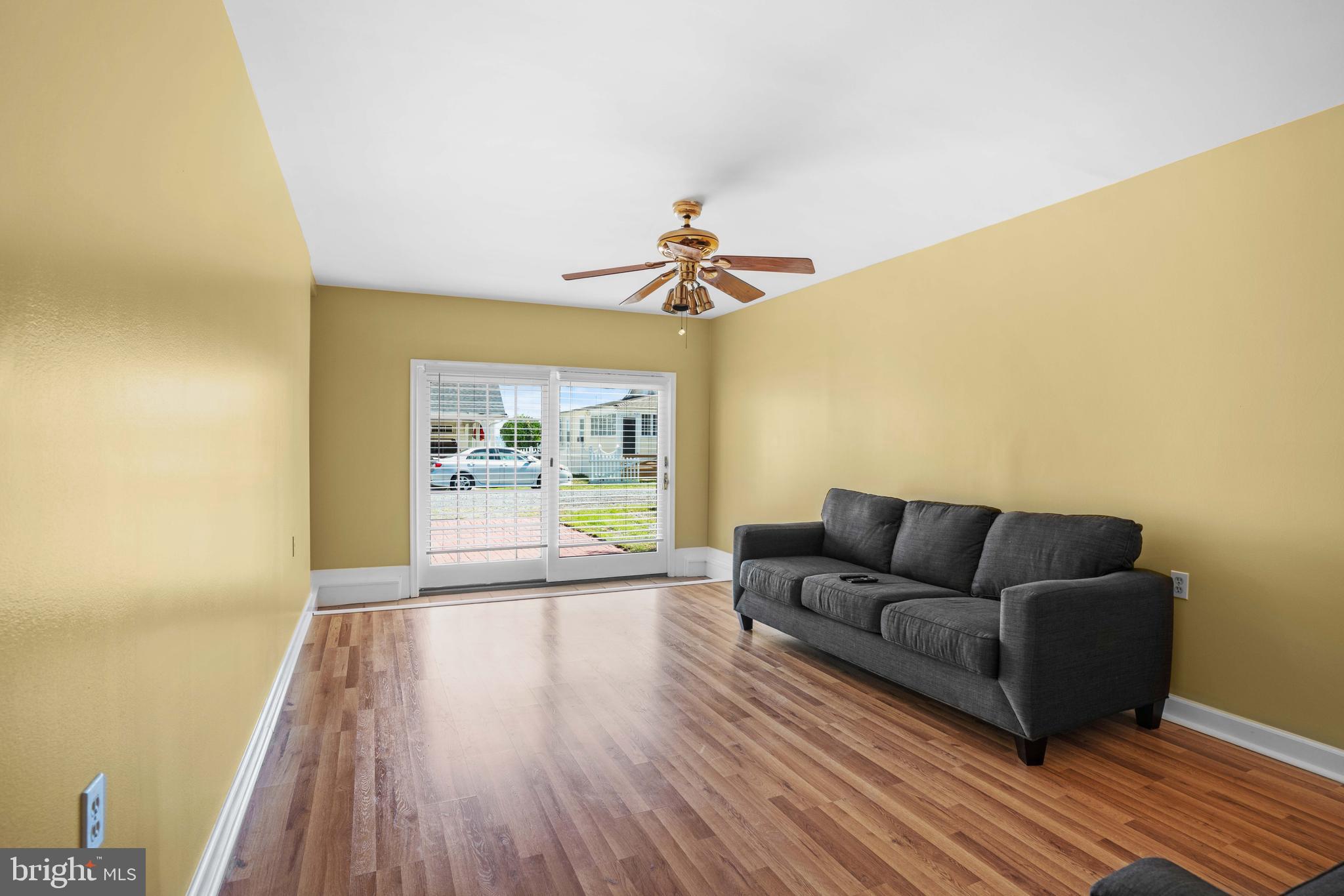 4734 Oak Road Shady Side, MD 20764 - Photo 30 of 48 a living room with furniture and a wooden floor