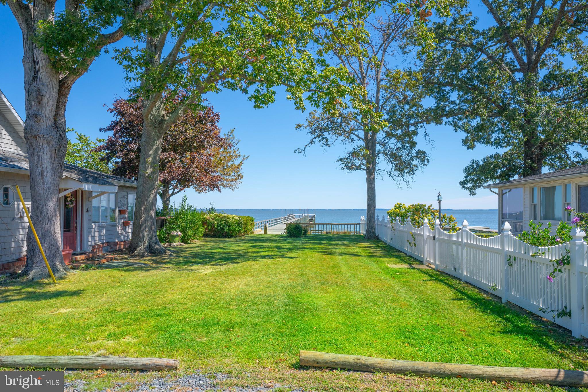 4734 Oak Road Shady Side, MD 20764 - Photo 40 of 48 a view of a swimming pool with a yard