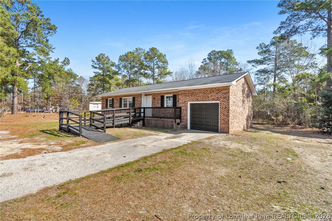 402 Gainey Road Raeford, NC 28376 - Photo 2 of 30 front view of a house with a yard