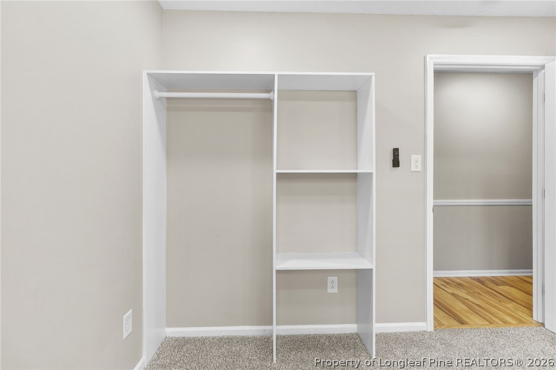 402 Gainey Road Raeford, NC 28376 - Photo 25 of 30 a view of closet area with empty racks