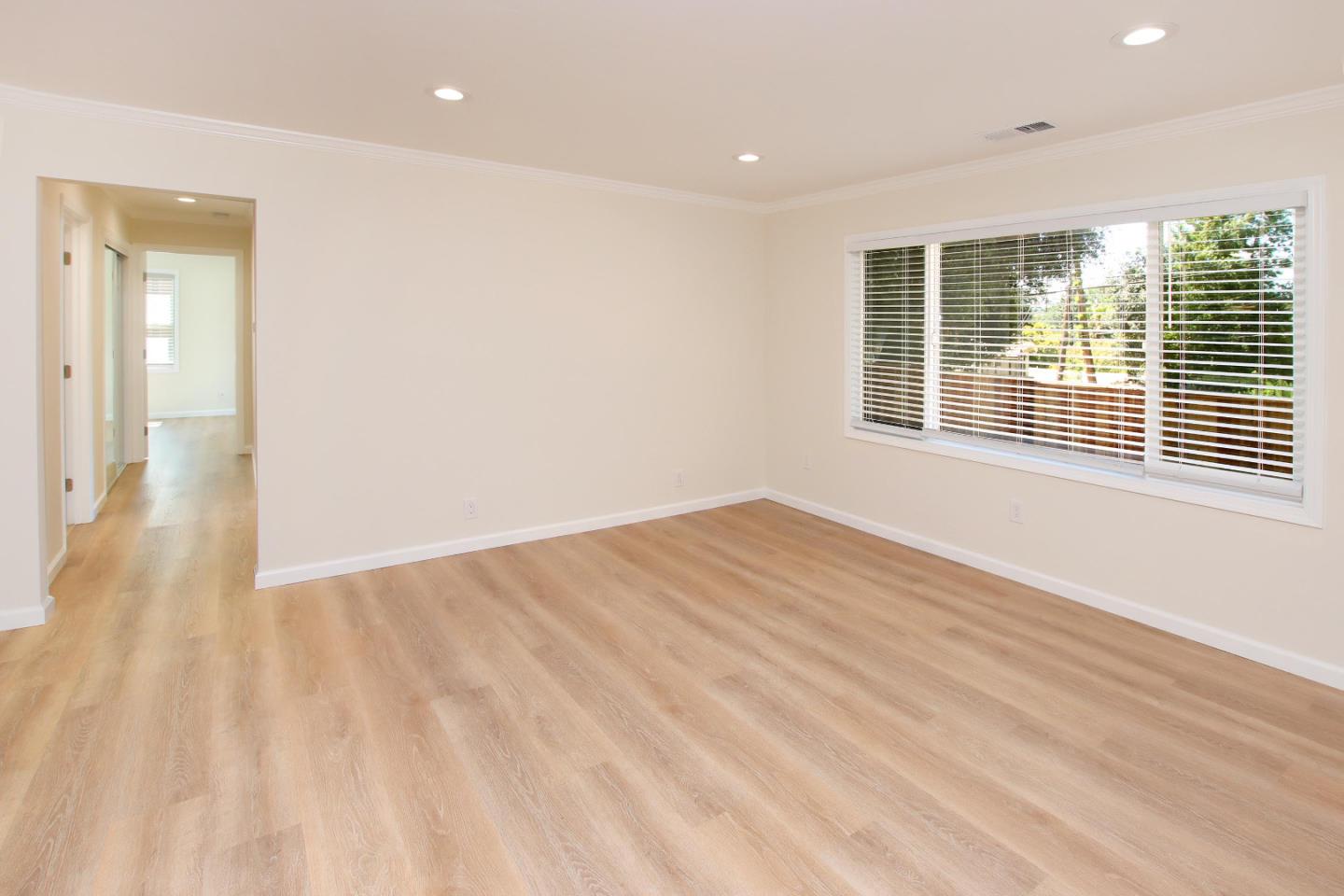 9260 Glen Arbor Road Ben Lomond, CA 95005 - Photo 17 of 33 a view of an empty room with wooden floor and a window
