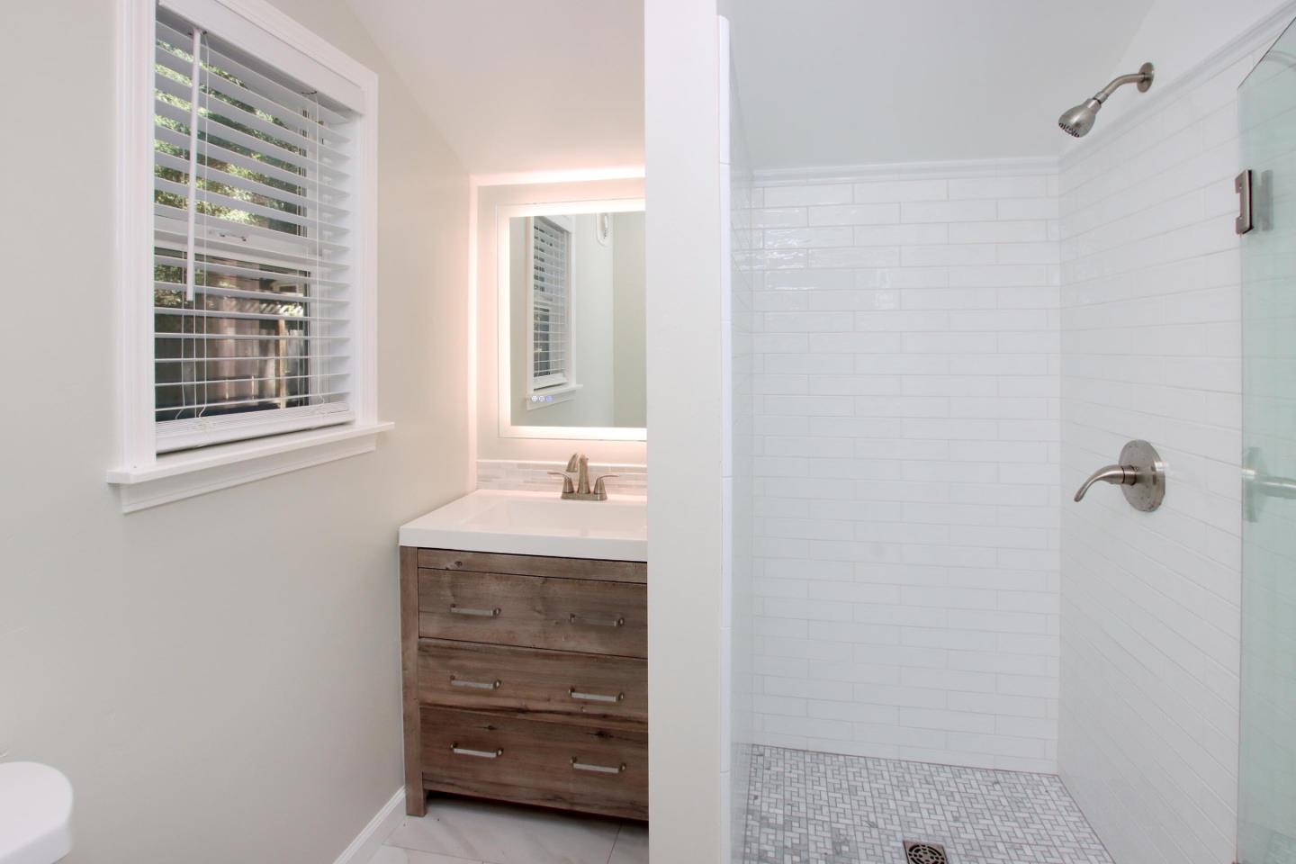 9260 Glen Arbor Road Ben Lomond, CA 95005 - Photo 19 of 33 a bathroom with a sink a toilet and shower