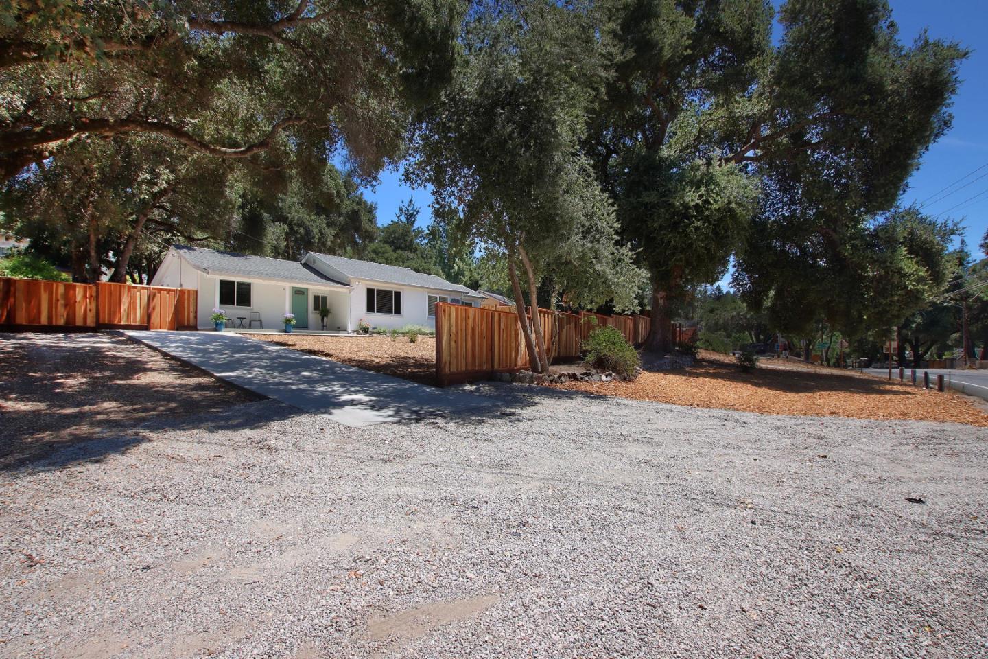 9260 Glen Arbor Road Ben Lomond, CA 95005 - Photo 24 of 33 a view of house with yard and trees in the background