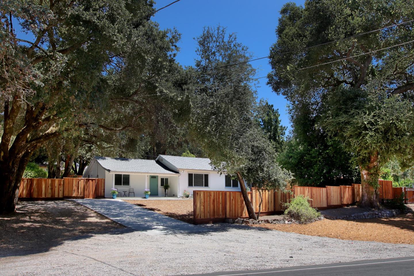 9260 Glen Arbor Road Ben Lomond, CA 95005 - Photo 25 of 33 a front view of a house with a garden