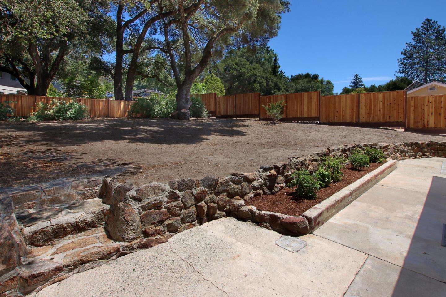 9260 Glen Arbor Road Ben Lomond, CA 95005 - Photo 29 of 33 a view of backyard with large tree and wooden fence