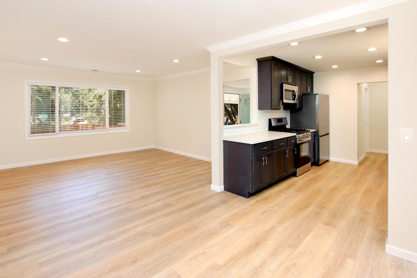 9260 Glen Arbor Road Ben Lomond, CA 95005 - Photo 10 of 33 a kitchen with stainless steel appliances granite countertop a stove and a sink