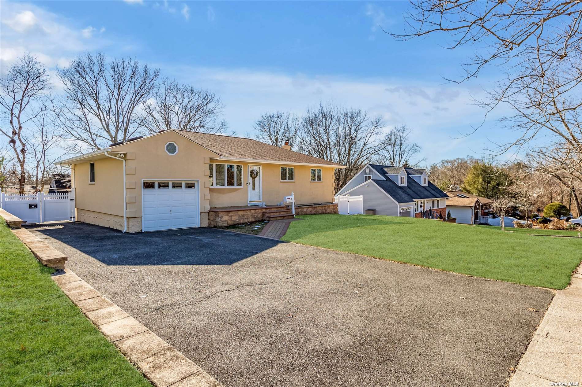 38 Echo Lane Kings Park, NY 11754 - Photo 1 of 1 a front view of house with yard and green space