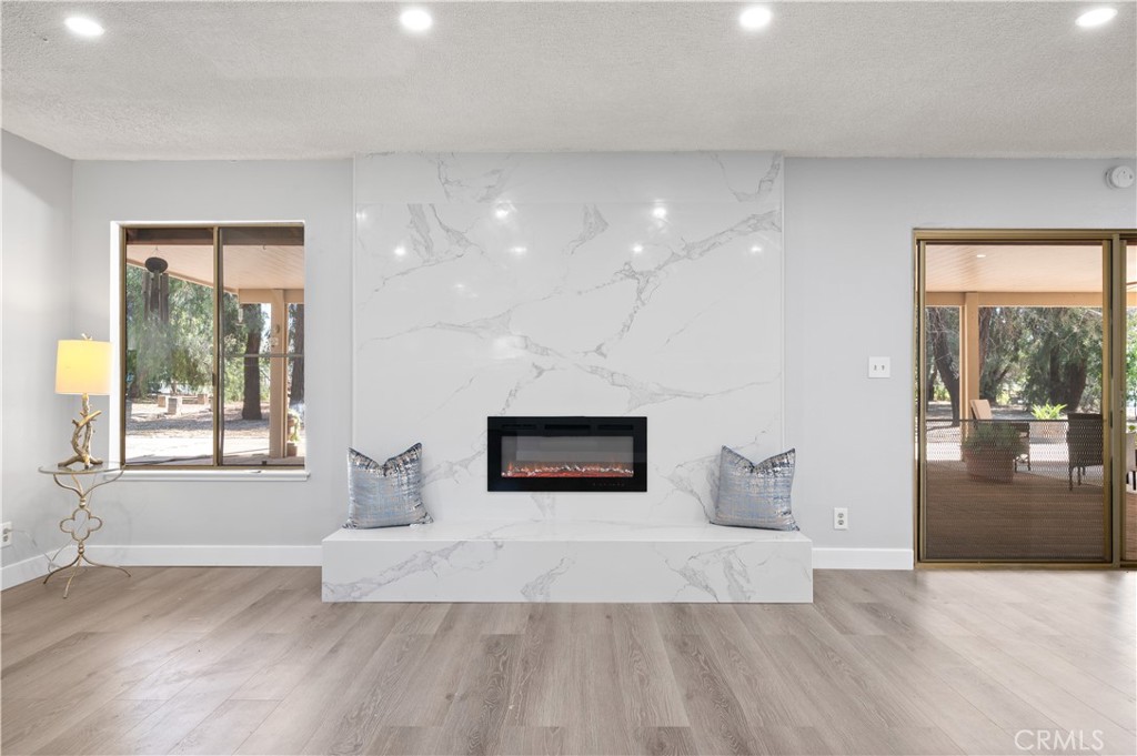 18561 Bert Road Riverside, CA 92508 - Photo 12 of 72 wooden floor in an empty room with a window