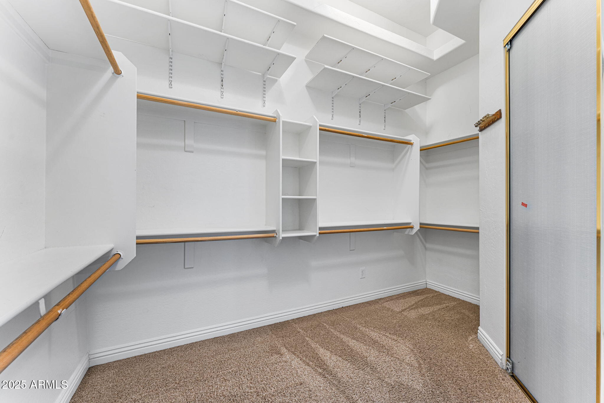 4410 East Robin Lane Phoenix, AZ 85050 - Photo 24 of 44 a view of an empty walk in closet
