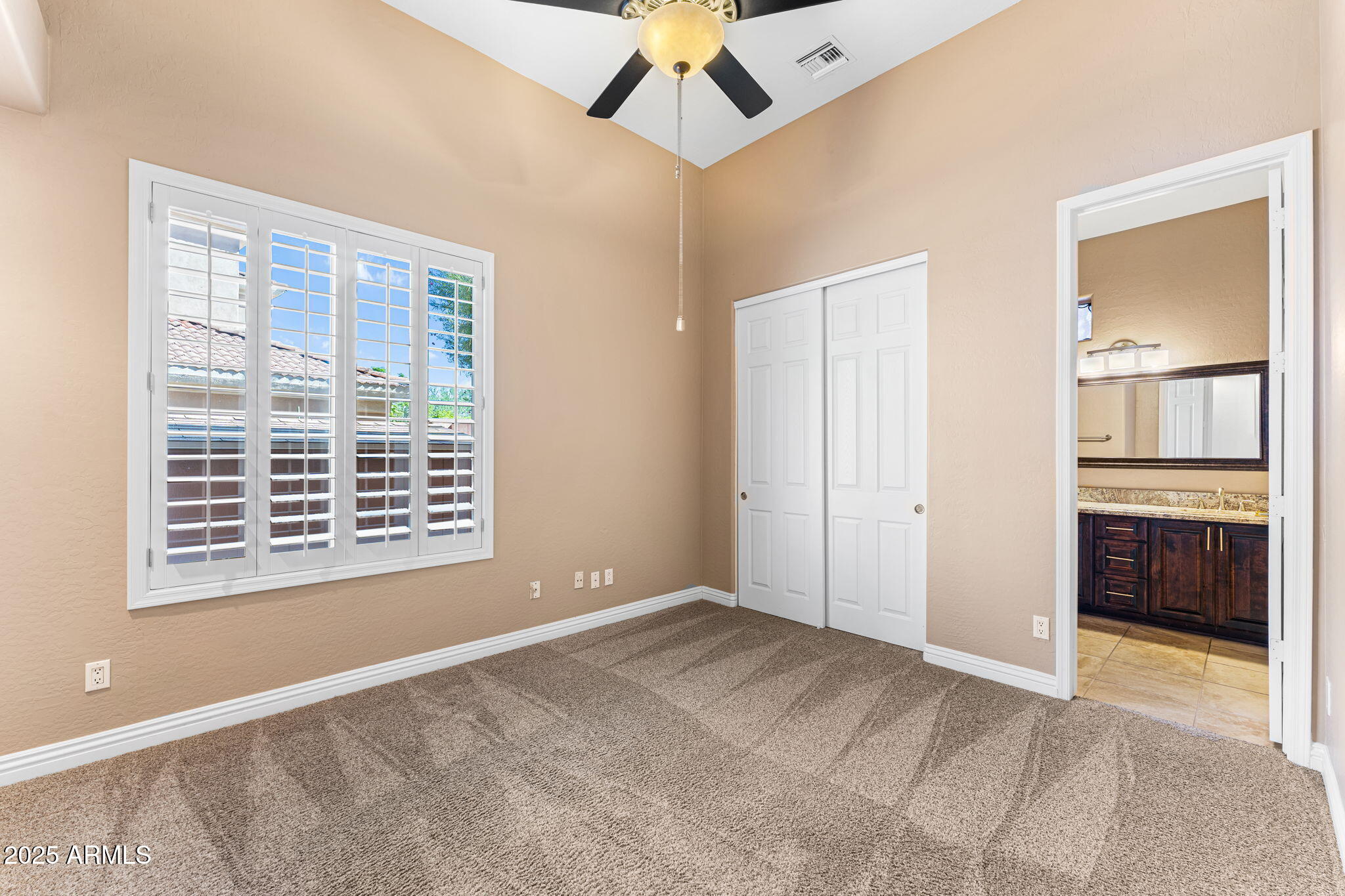 4410 East Robin Lane Phoenix, AZ 85050 - Photo 32 of 44 a view of an empty room with a window