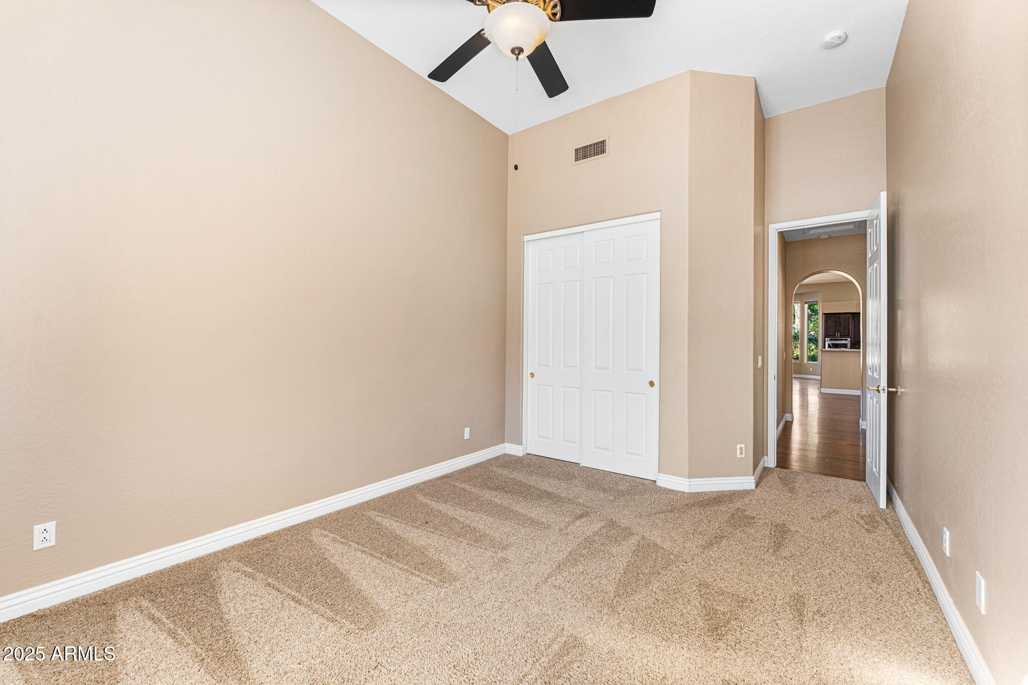 4410 East Robin Lane Phoenix, AZ 85050 - Photo 35 of 44 a view of a room with a ceiling fan