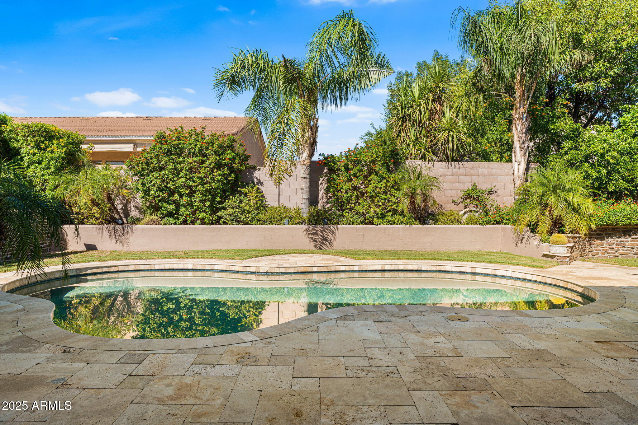 4410 East Robin Lane Phoenix, AZ 85050 - Photo 39 of 44 a view of swimming pool with a yard