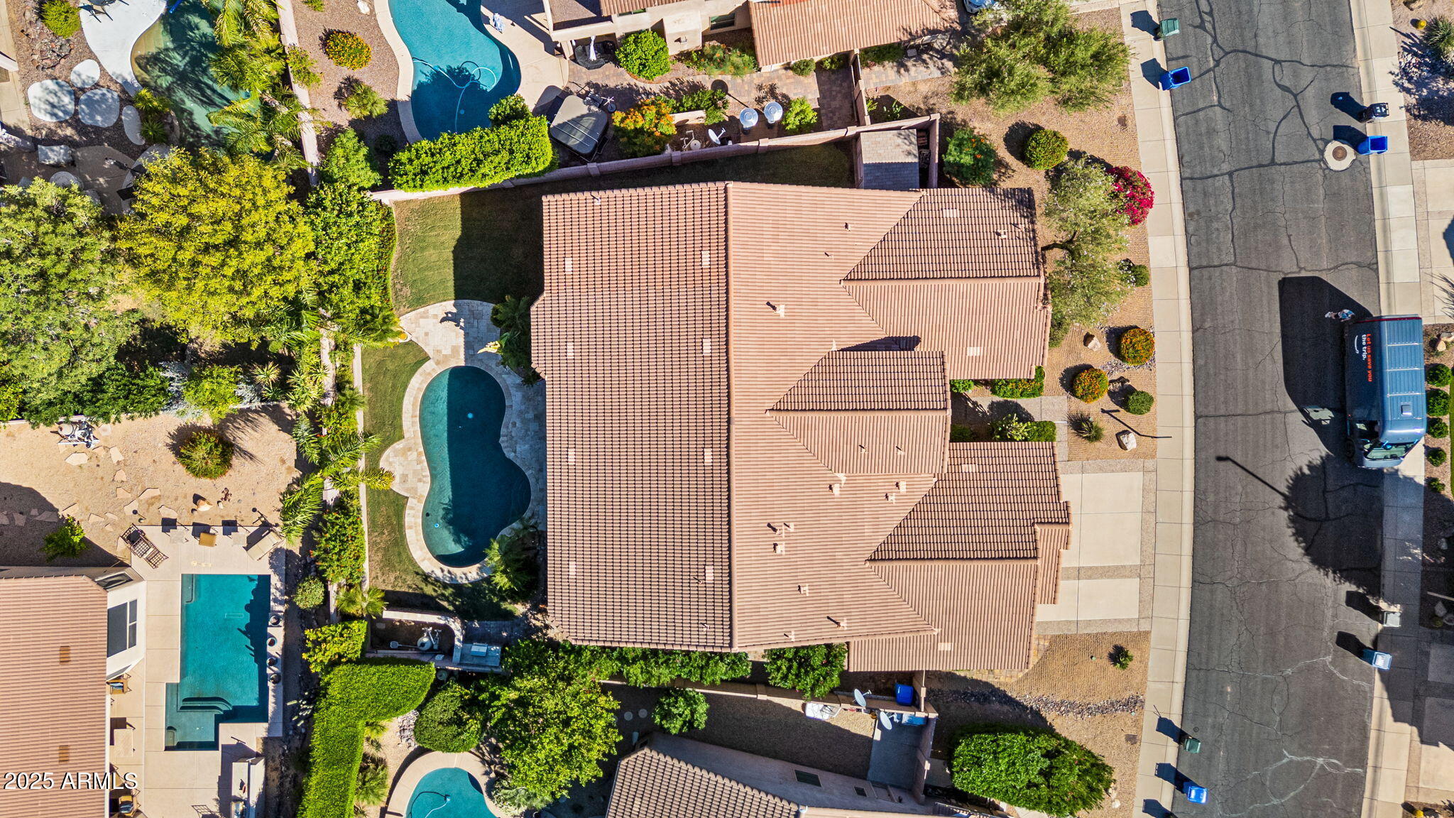 4410 East Robin Lane Phoenix, AZ 85050 - Photo 42 of 44 an aerial view of a house with a yard and fountain