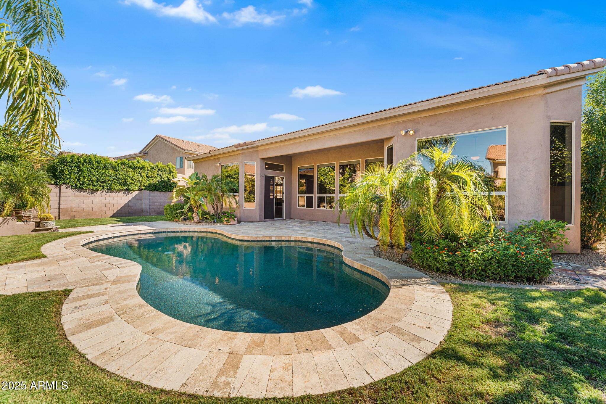 4410 East Robin Lane Phoenix, AZ 85050 - Photo 4 of 44 a view of a swimming pool with a patio