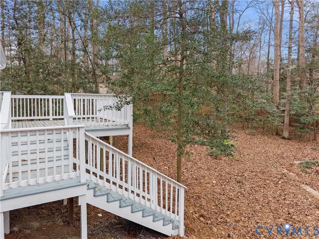 a view of balcony with wooden floor