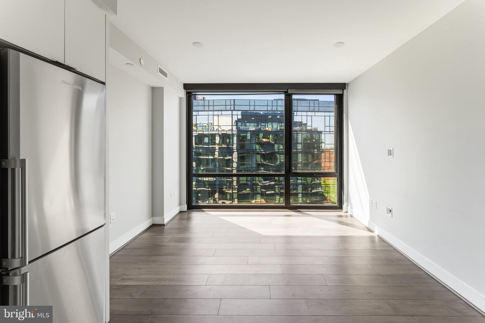 1300 4th Street Southeast, Unit 902 Washington, DC 20003 - Photo 25 of 68 Bright, floor to ceiling windows with city views.