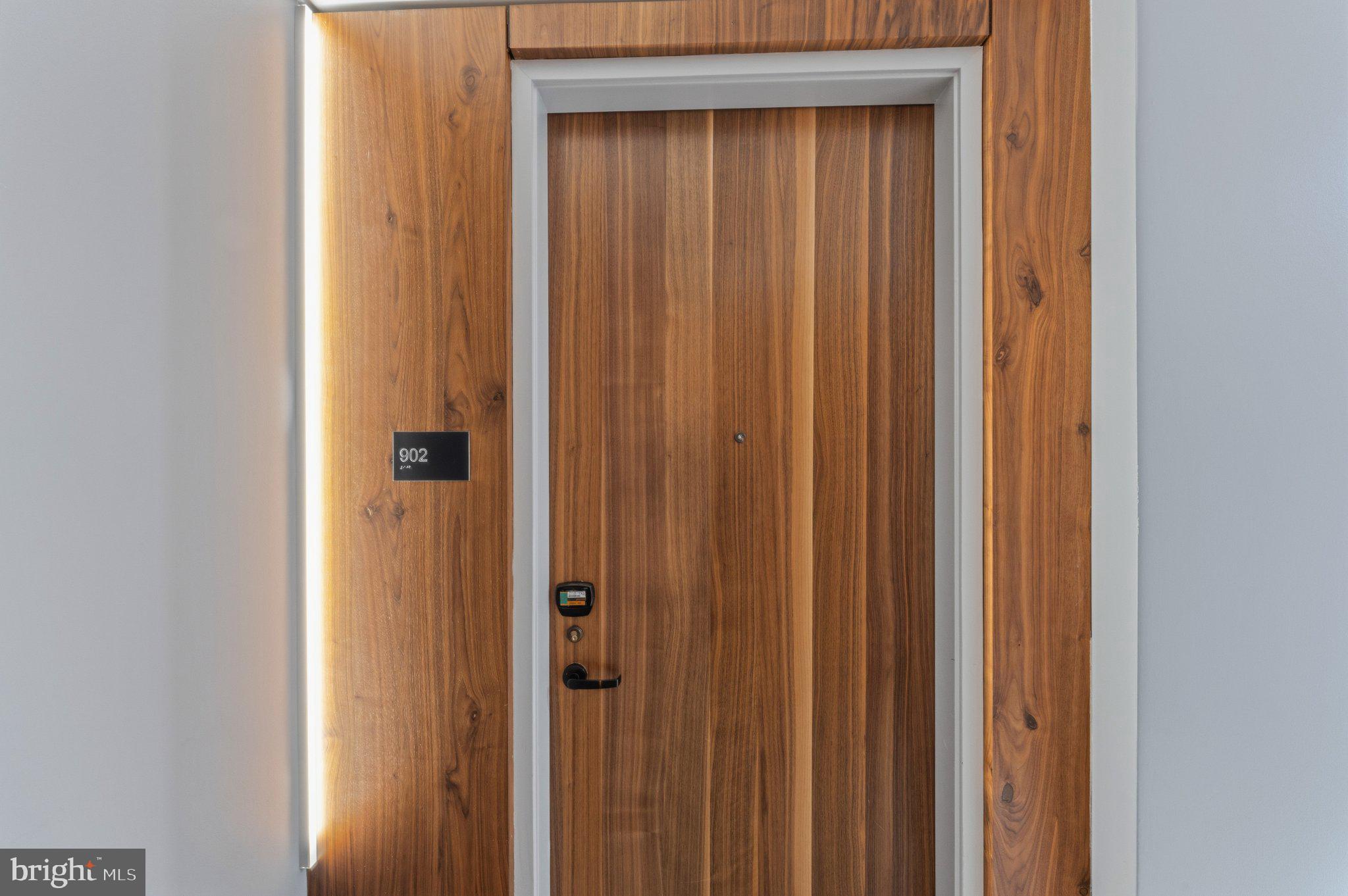 1300 4th Street Southeast, Unit 902 Washington, DC 20003 - Photo 3 of 68 Elegant wooden door with modern accents.