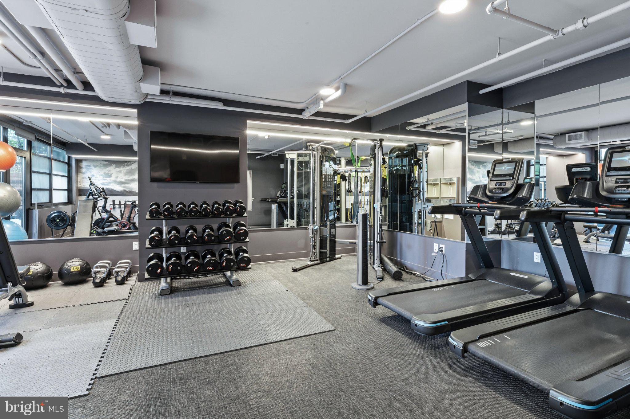 1300 4th Street Southeast, Unit 902 Washington, DC 20003 - Photo 51 of 68 Modern fitness space with sleek design.