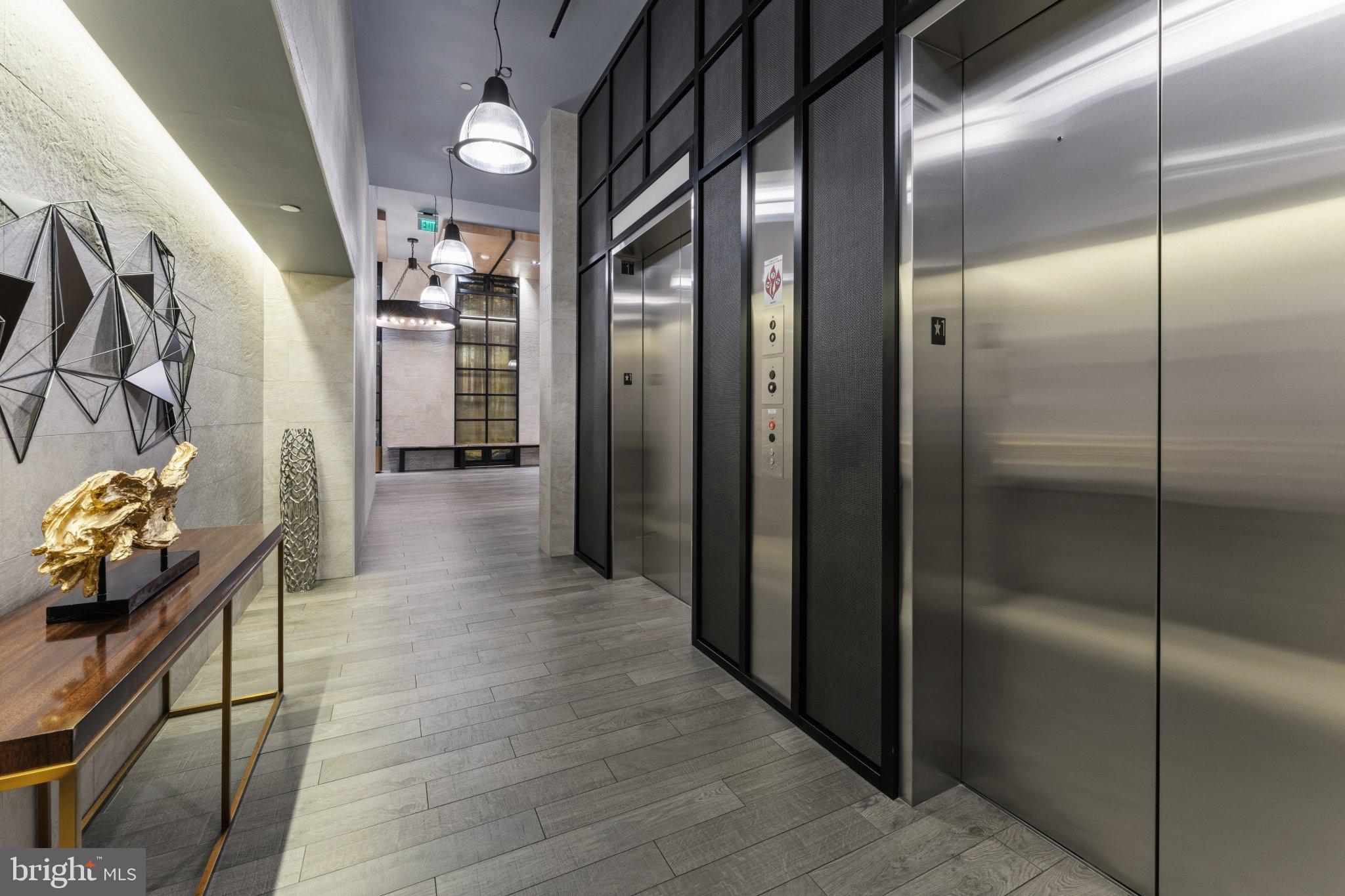 1300 4th Street Southeast, Unit 902 Washington, DC 20003 - Photo 54 of 68 Sleek modern lobby with stylish elevators.