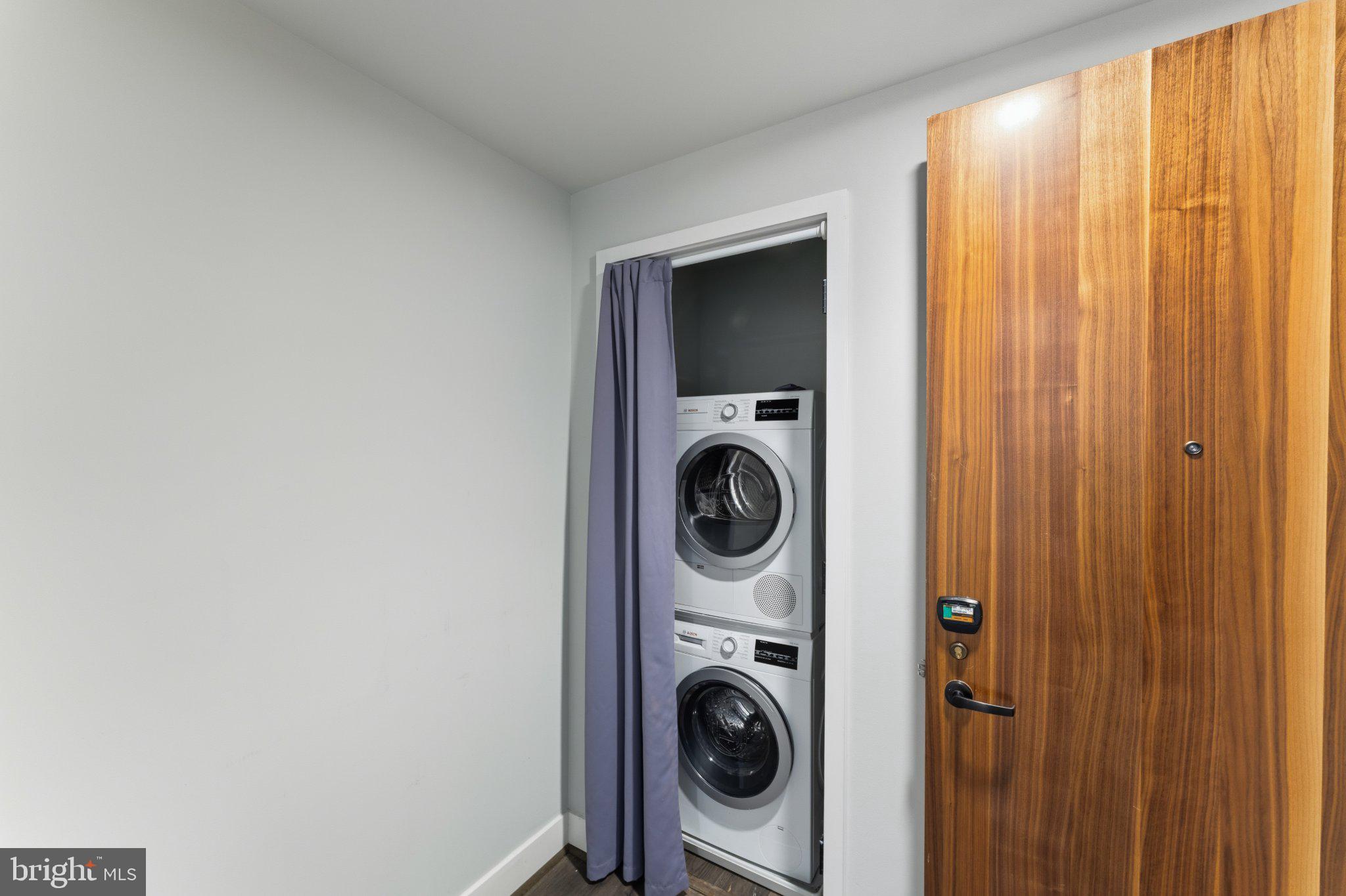 1300 4th Street Southeast, Unit 902 Washington, DC 20003 - Photo 6 of 68 Compact laundry nook with stylish door.