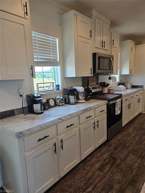 1266 Quaker Church Road Siloam, NC 27047 - Photo 7 of 29 Lots of cabinets and countertop space