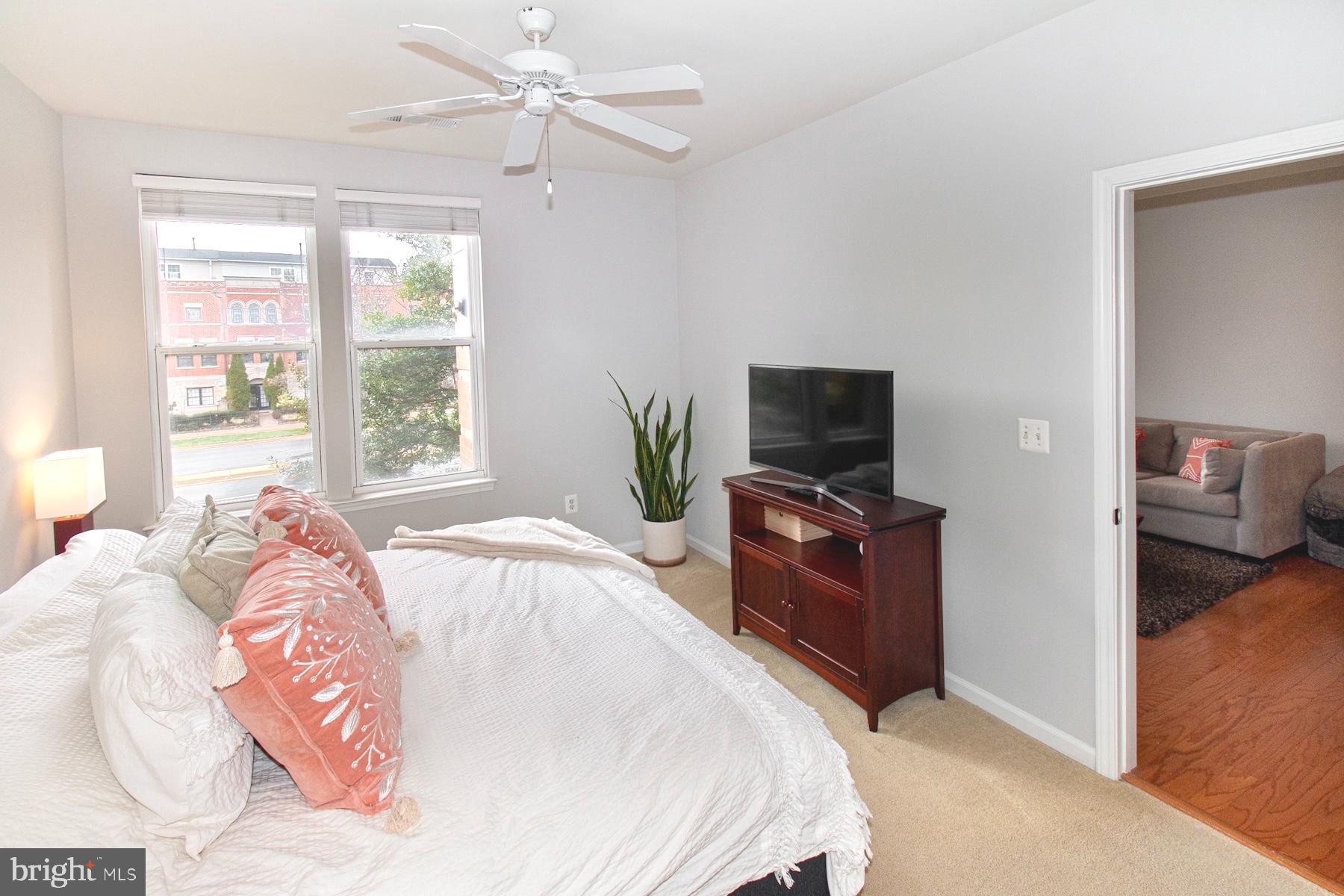 12001 Market Street, Unit 127 Reston, VA 20190 - Photo 15 of 27 Spacious, freshly painted bedroom.