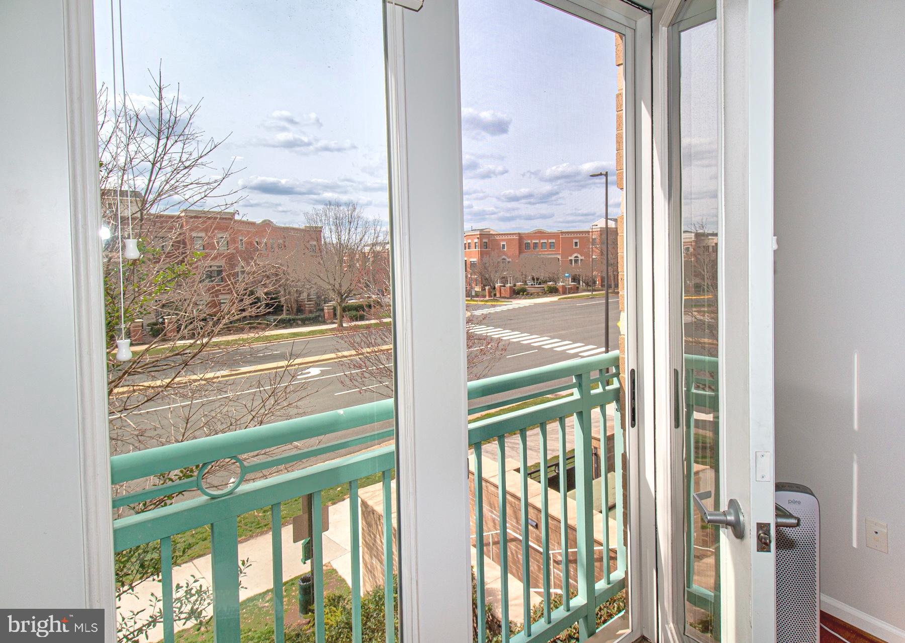 12001 Market Street, Unit 127 Reston, VA 20190 - Photo 17 of 27 French doors in Living room lots of natural light!