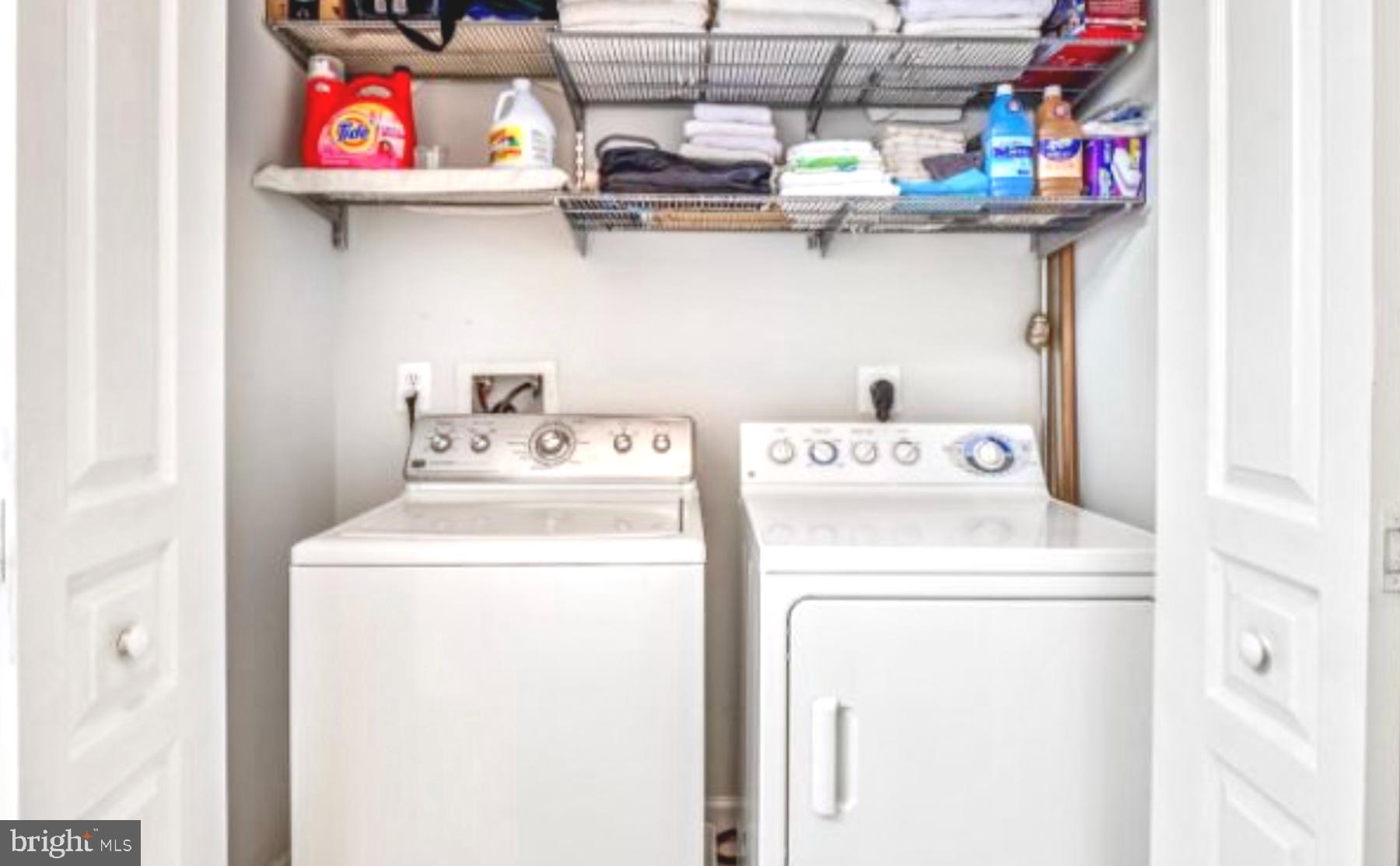 12001 Market Street, Unit 127 Reston, VA 20190 - Photo 18 of 27 Full size washer & dryer in unit.