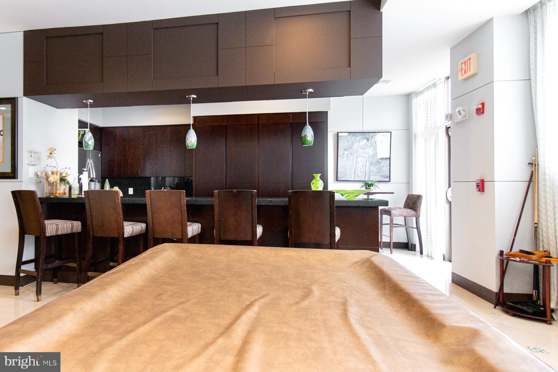 12001 Market Street, Unit 127 Reston, VA 20190 - Photo 23 of 27 Party/Game room with pool table